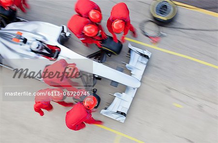 Racing team working at pit stop