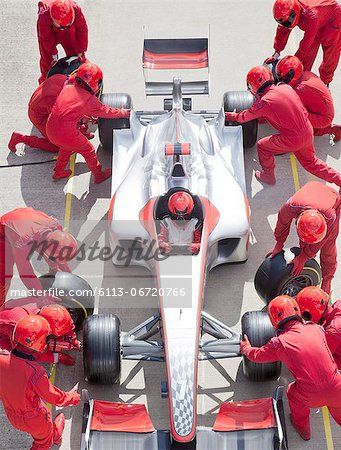 Racing team working at pit stop