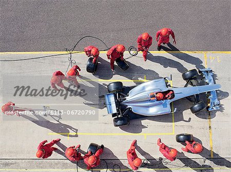 Racing team working at pit stop