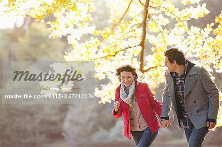 Couple walking together in park