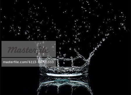 Close up of splashing water droplet Close up of splashing water droplet