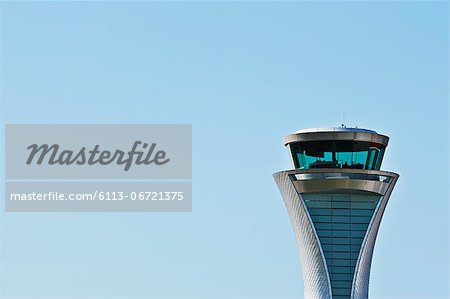 Air traffic control tower and blue sky