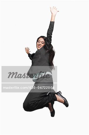 Businesswoman jumping