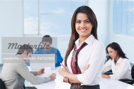 Portrait of a businesswoman smiling with her colleague