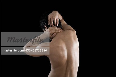 Man suffering from neckache