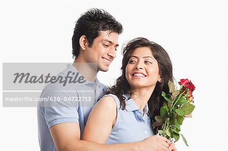Romantic couple with red roses