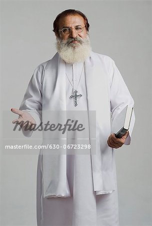 Portrait of a priest gesturing