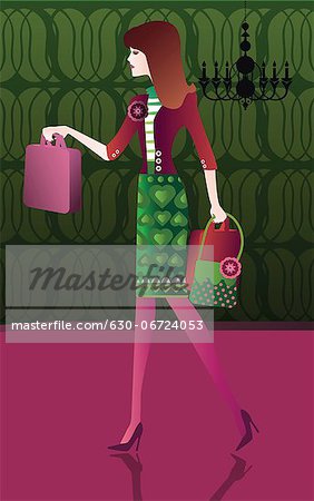 Woman carrying shopping bags and walking