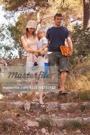 Croatia, Dalmatia, Parents with one child arriving on camp site