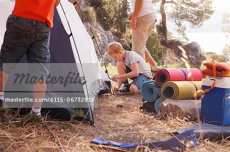 Croatia, Dalmatia, Family holidays on camp site, pitching the tent