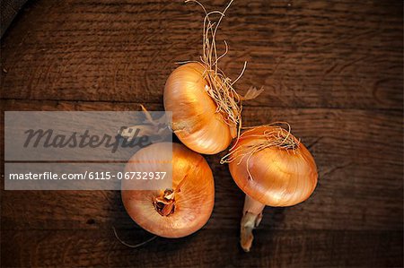 Three Onions On Wooden Table, Croatia, Slavonia, Europe