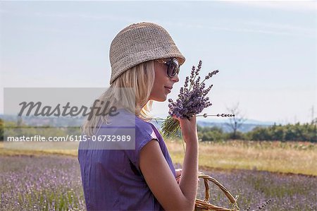 Young Woman Holding Bunch Of Lavender in Hands, Croatia, Dalmatia, Europe