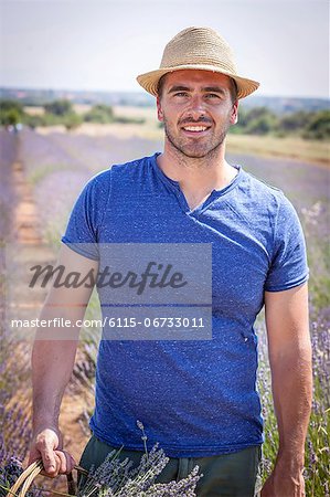 Young Couple In Lavender Field, Croatia, Dalmatia, Europe Young Couple In Lavender Field, Croatia, Dalmatia, Europe