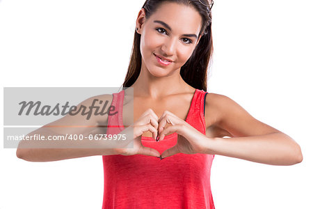 Beautiful woman making a heart symbol with her hands, isolated on white background