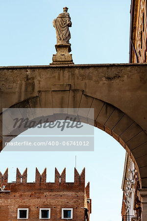 Arch and Statue near Piazza delle Erbe in Verona, Veneto, Italy