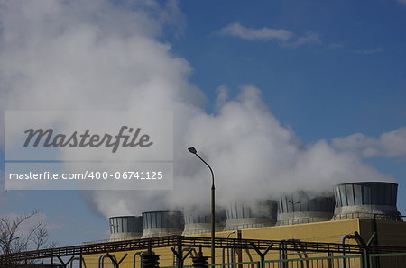 factory and smoke from chimneys