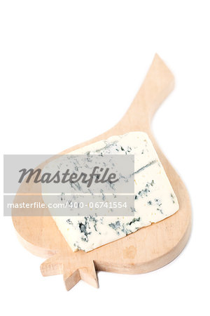 Blue cheese on cutting board isolated on white background