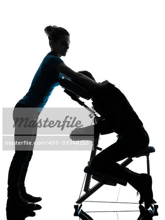 one man and woman performing chair massage in silhouette studio on white background