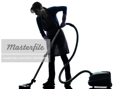 one caucasian woman maid Vacuum Cleaner cleaning  in silhouette studio isolated on white background