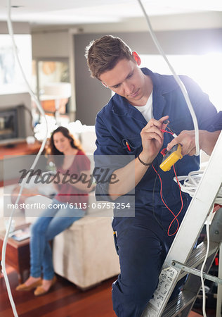 Electrician working in home