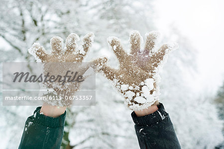 Close up of snowy gloves