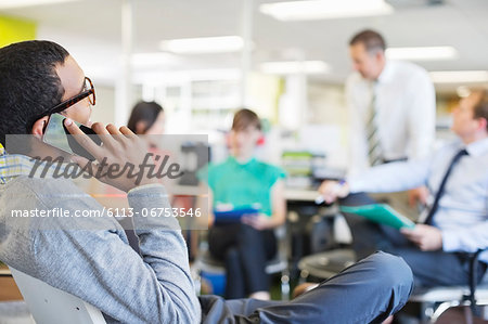 Businessman talking on cell phone