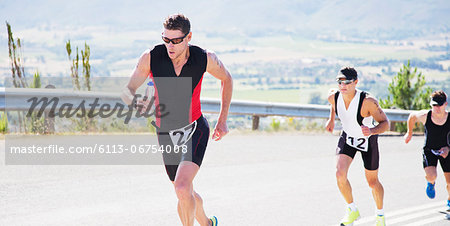 Runners in race on rural road