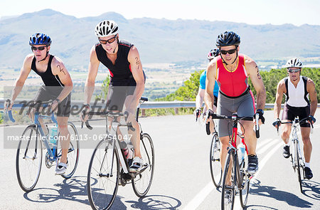 Cyclists in race on rural road