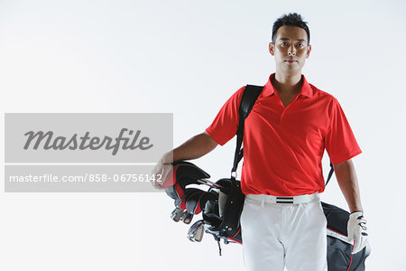 Golfer Carrying Golf-Club Bag