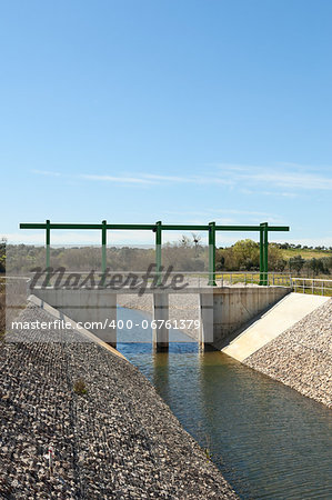 Almost finished sluice gate in the water diversion canal upstream the Alvito reservoir near Oriola village, part of the Alqueva Irrigation Plan, Alentejo, Portugal