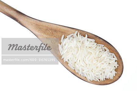 Closeup overview of rice in a wooden spoon