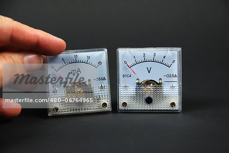 Stock pictures of traditional and analog electrical meters