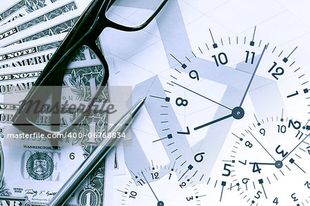 Business concept. Dollar bank notes and clock face on background with business chart