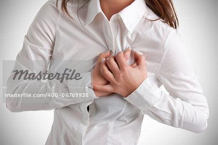 Woman having a pain in the heart area