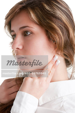 Woman checking her heart heart rate holding her fingers to her neck, isolated in white