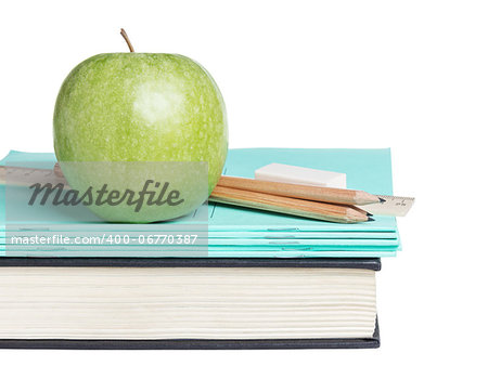 school supplies with apple on book, isolated on white