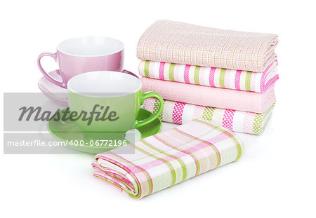 Kitchen towels and coffee cups. Isolated on white background