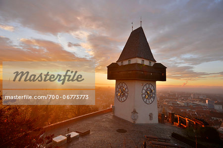 Uhrturm Clock Tower on Schlossberg Mountain Overlooking City at Early Morning, Graz, Styria, Austria