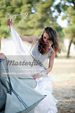 Bride Holding Wedding Dress, Croatia, Europe