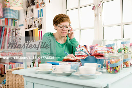 Woman Using Mobile Phone, Munich, Bavaria, Germany, Europe