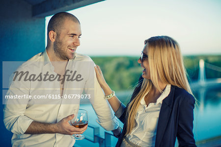 Young Couple On Balcony, Osijek, Croatia