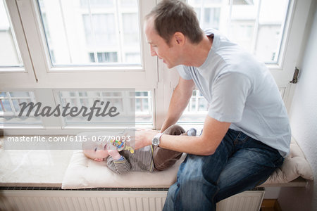 Young father with baby, Munich, Bavaria, Germany