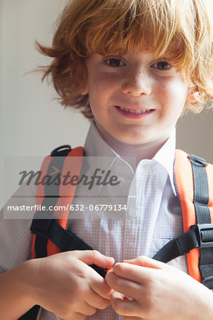 Boy wearing backpack, portrait