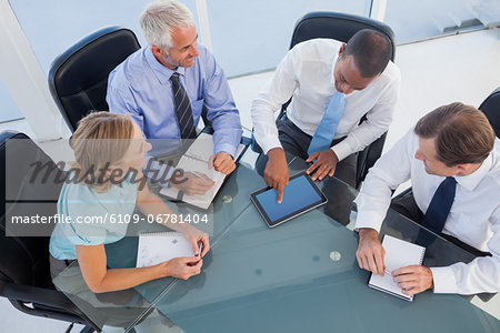 Business people using digital tablet