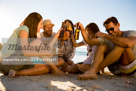 Friends partying on the beach
