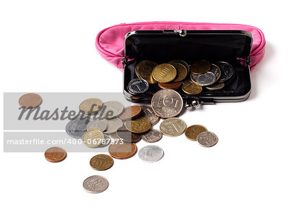 Pink leather purse and several different coins on white background