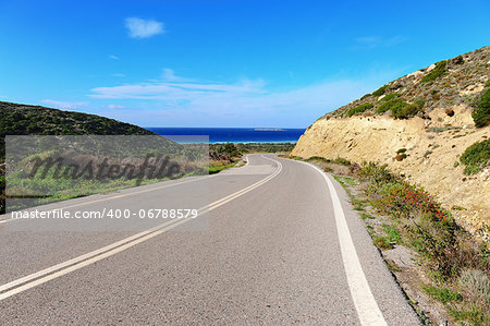 Asphalt  Road along the Coast of the Greek Island of Rhodes