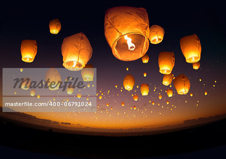 A large group of chinese flying lanterns.