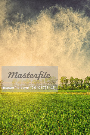 Sky field landscape on a textured vintage paper background