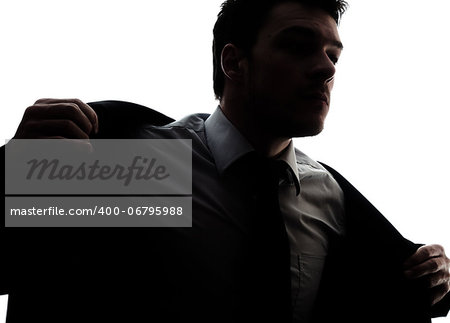 Businessman portrait silhouette getting dress - putting his jacket